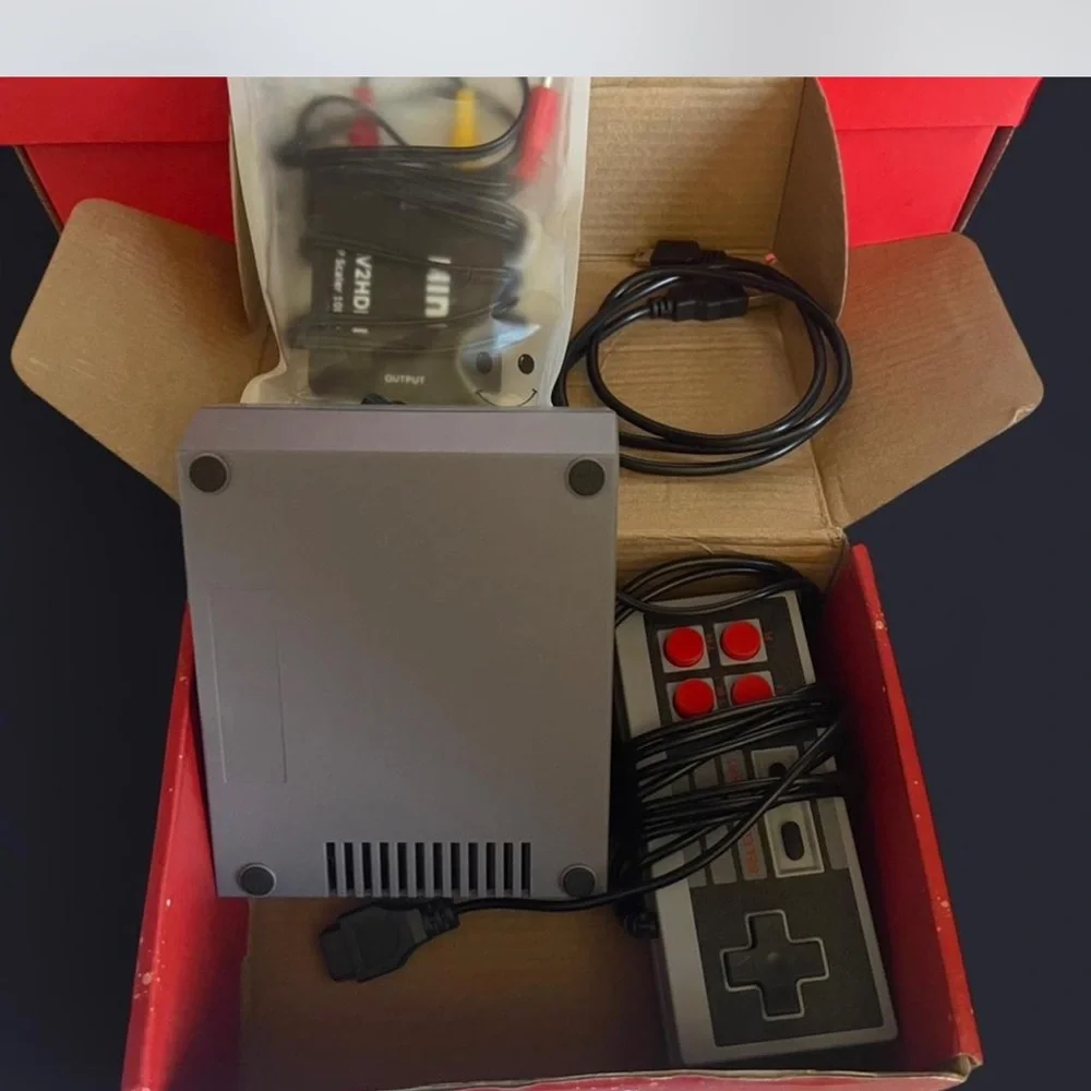 Nintendo gray mini console with wired controller